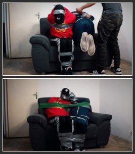 Tonny Tape BR – Sofa – Mauro Roll Taped BondageStrips And Tonny Together (Gay Bondage, Gagged Man)